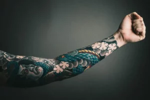 Best Tattoo Ideas, photo of left arm with tattoo